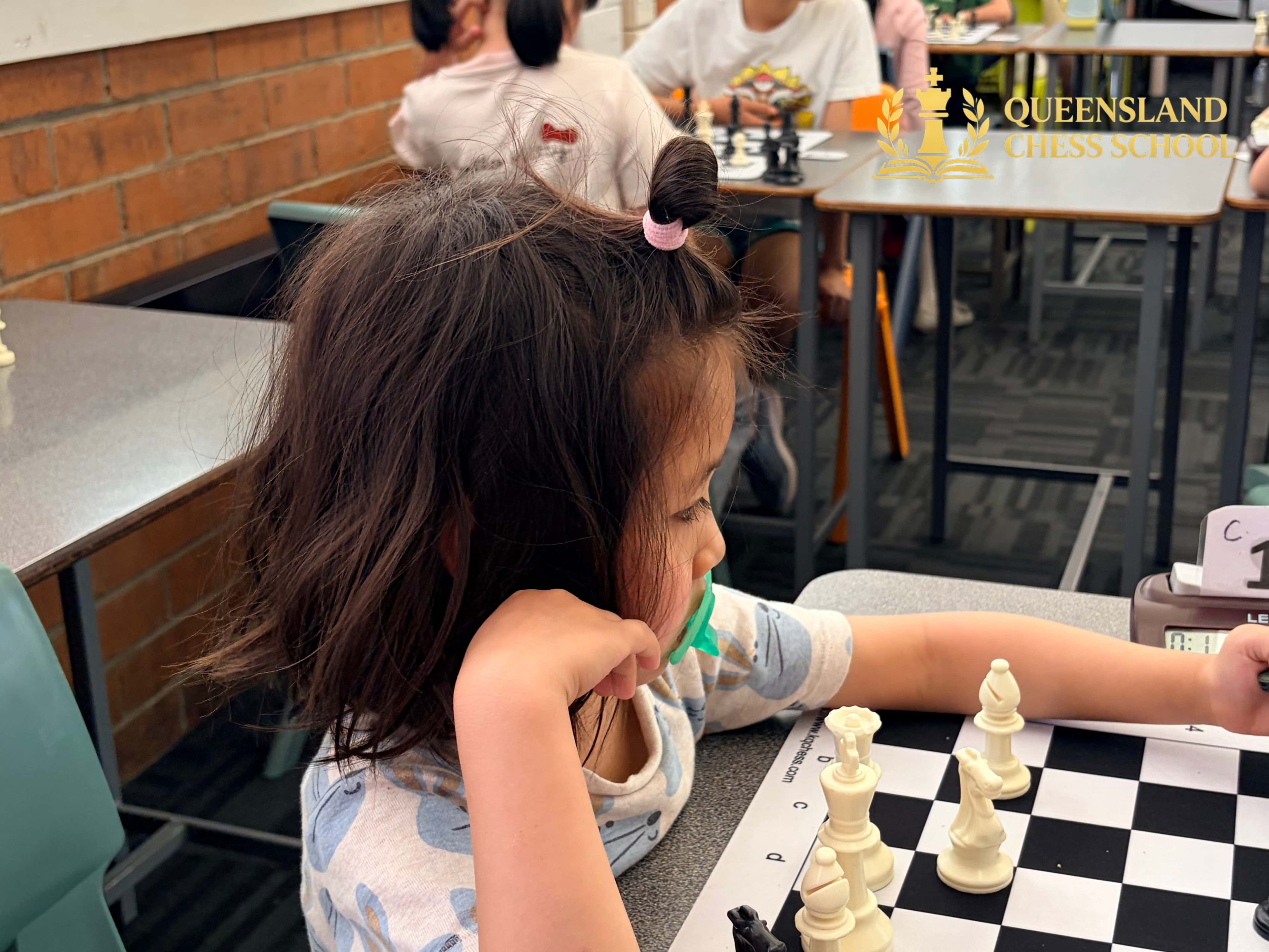 Young player concentrating during Queens Games 2026