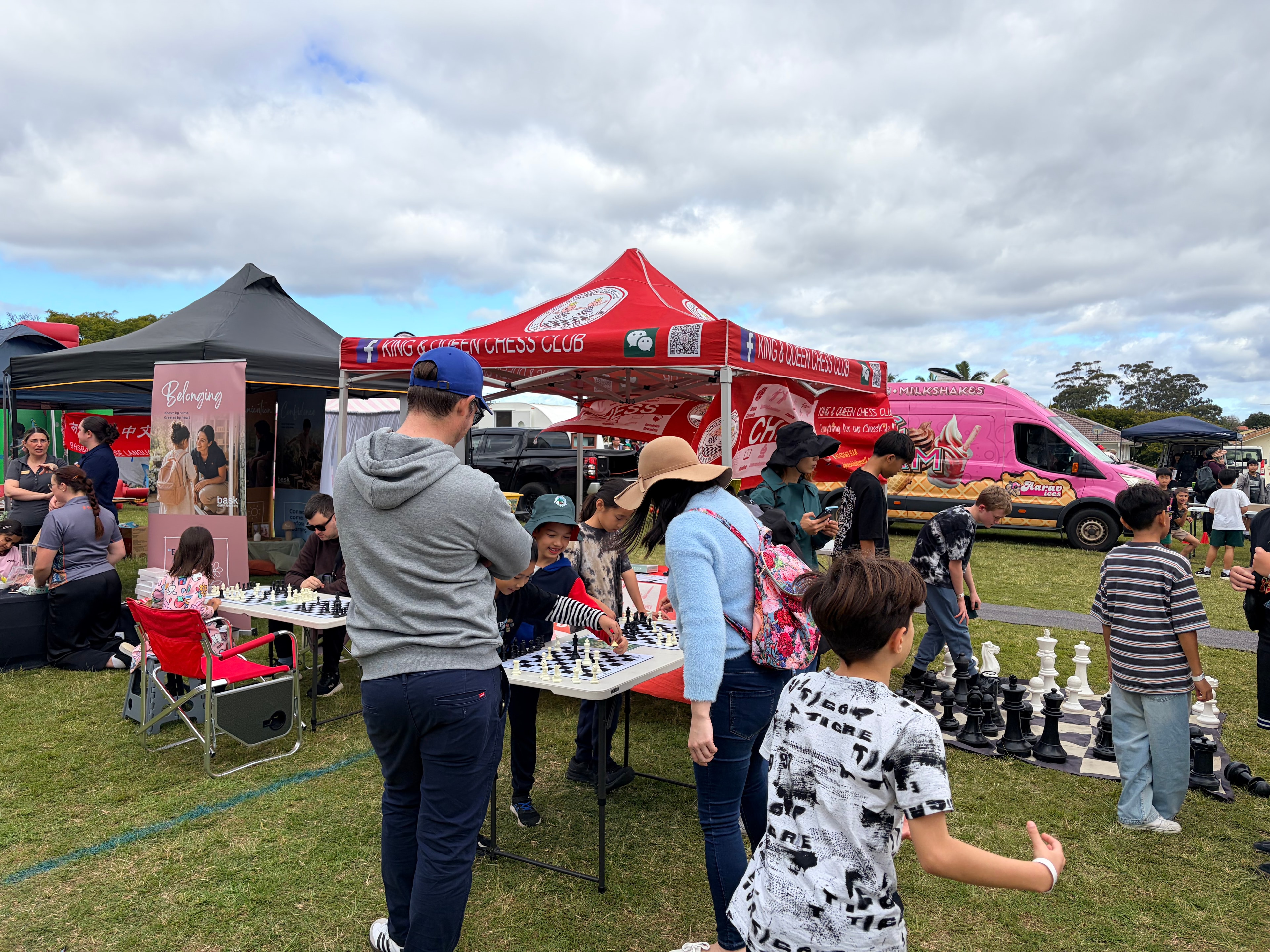Young chess players enjoying community games