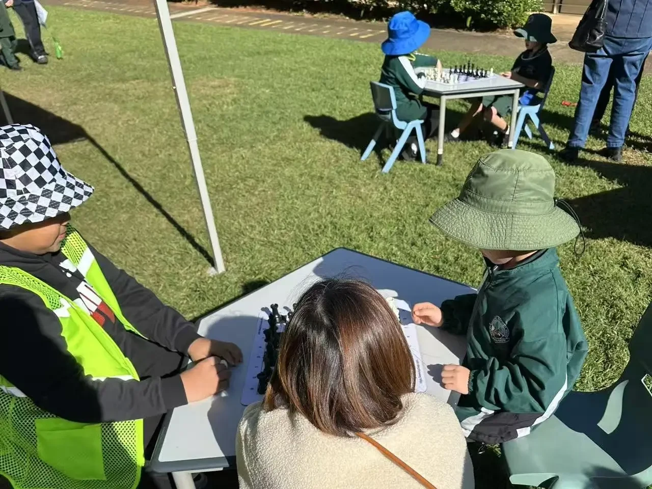 Young player enjoying chess at the carnival