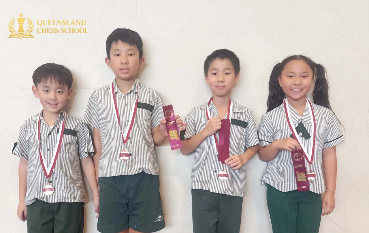 Queensland Chess School students celebrating Division C medal success