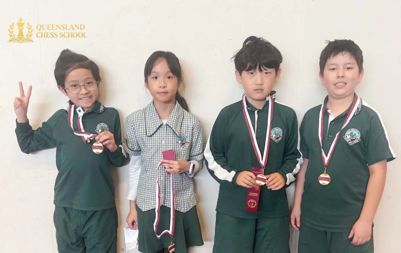 Division D medal-winning chess team at Logan Inter-School Chess Competition