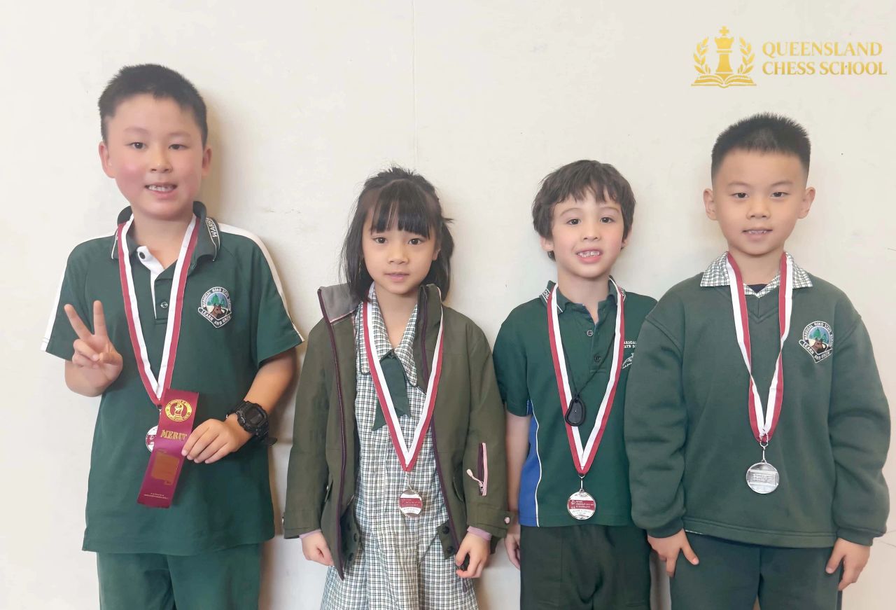 Division D medal-winning chess team at Logan Inter-School Chess Competition